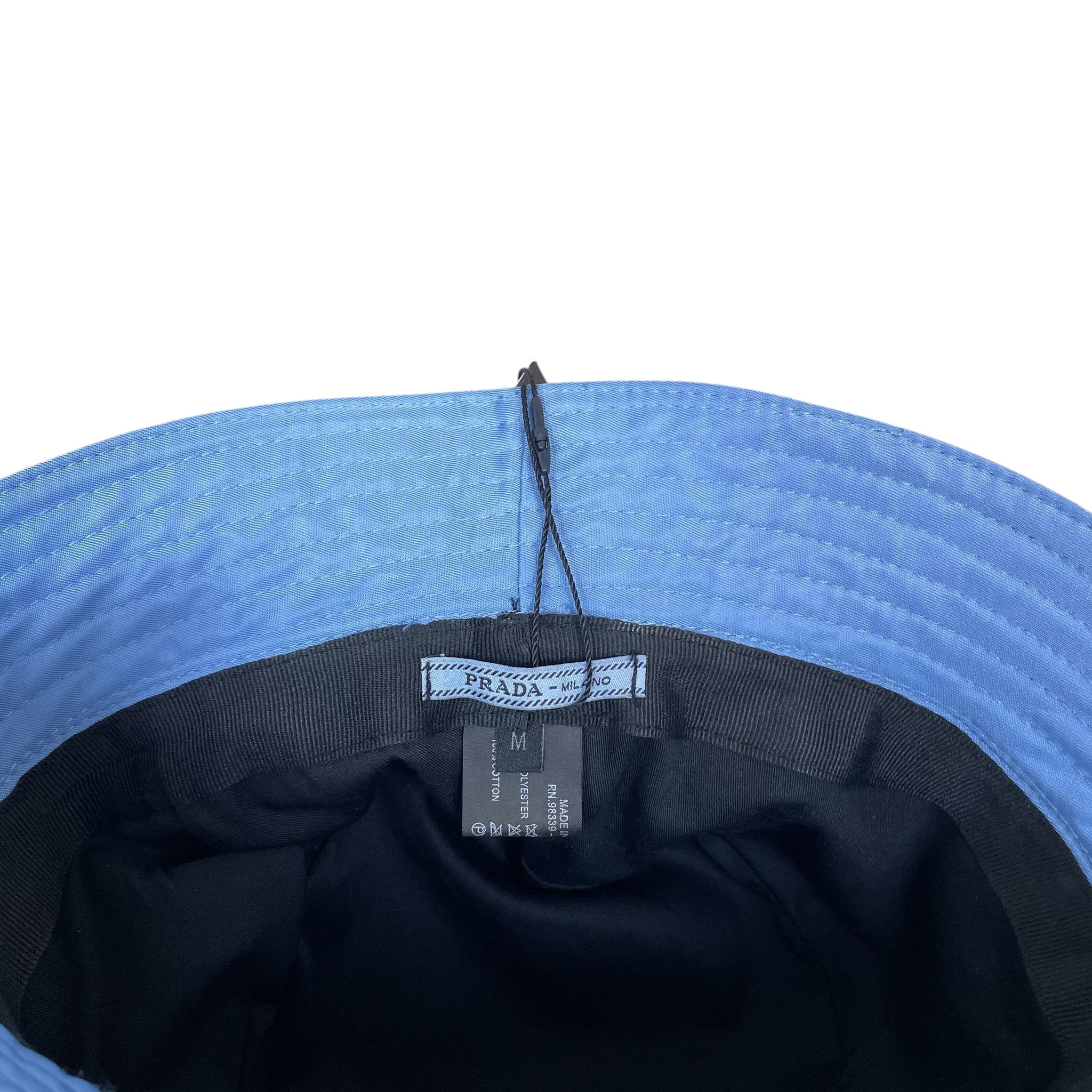Zenno Archive Prada baby blue nylon bucket hat interior view with size M tag and brand label