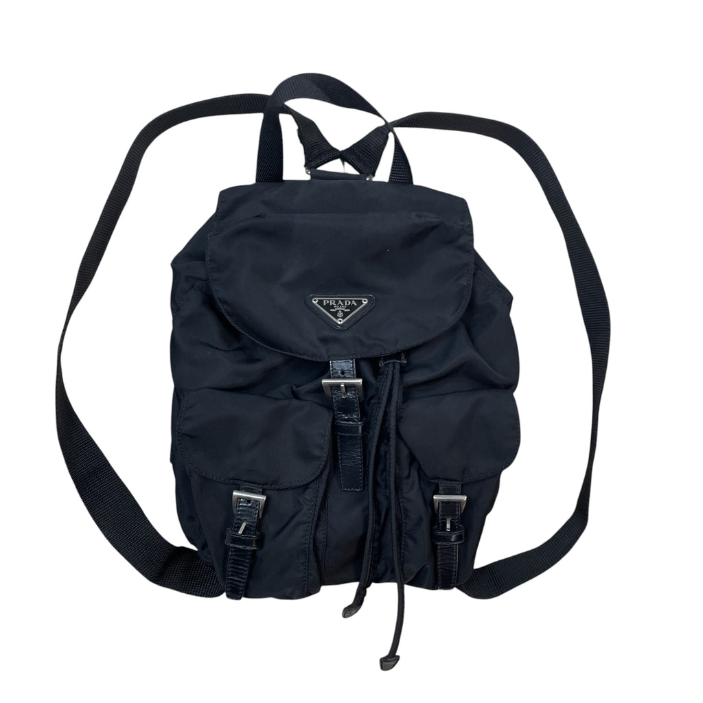 Zenno Archive black Prada Tessuto Montagna nylon backpack with flap closure, drawstring, and silver hardware.