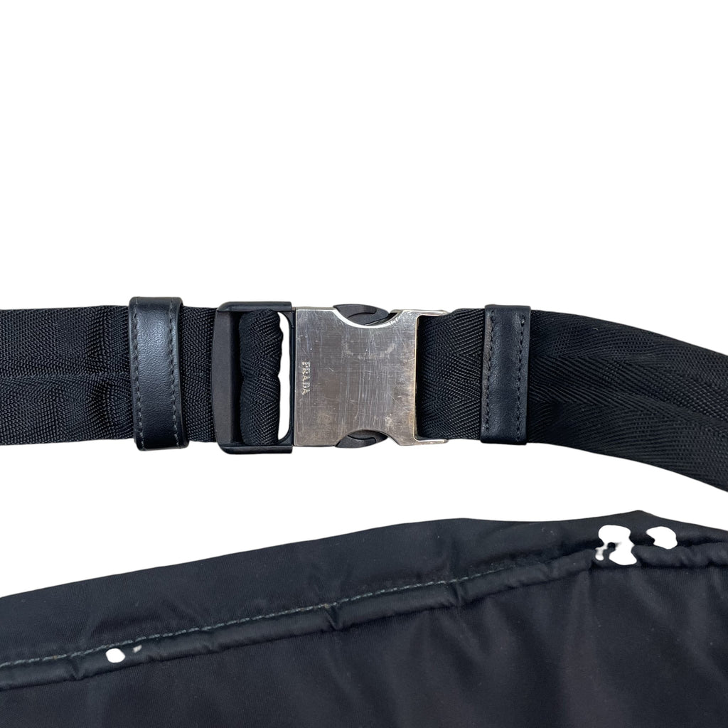 Zenno Archive Prada SS18 black nylon belt bag featuring a silver metal buckle with engraved Prada logo