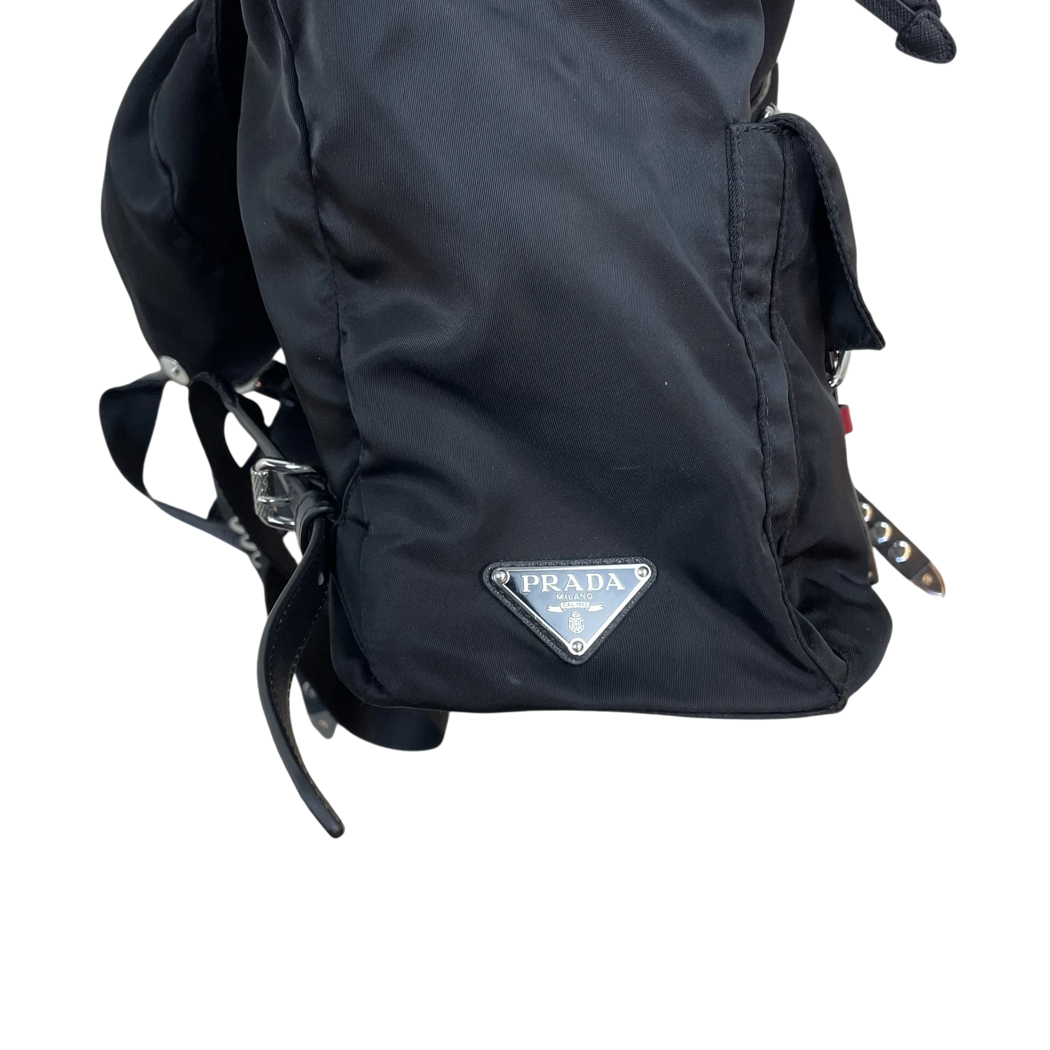 Zenno Archive Prada black nylon backpack featuring silver-tone metal studs and the iconic triangular logo plaque