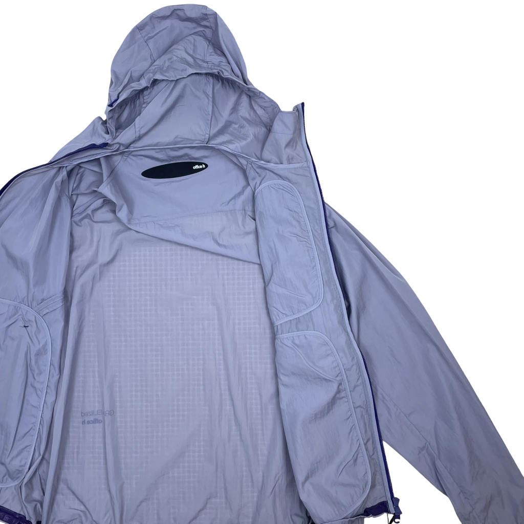 Zenno Archive Office H purple nylon hooded jacket with a lightweight grid texture and front zipper closure.