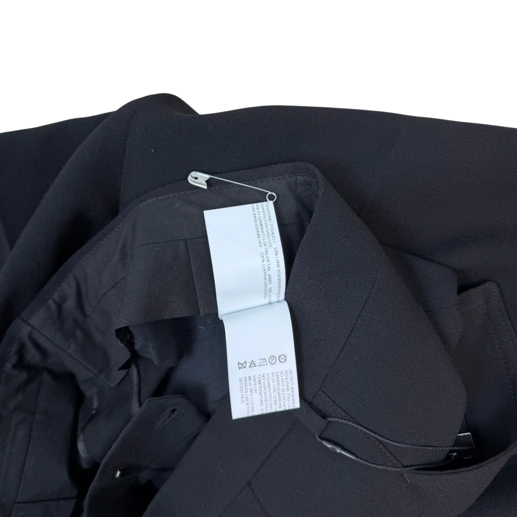 Zenno Archive Rick Owens black wool harness trousers featuring interior care labels and a silver safety pin detail