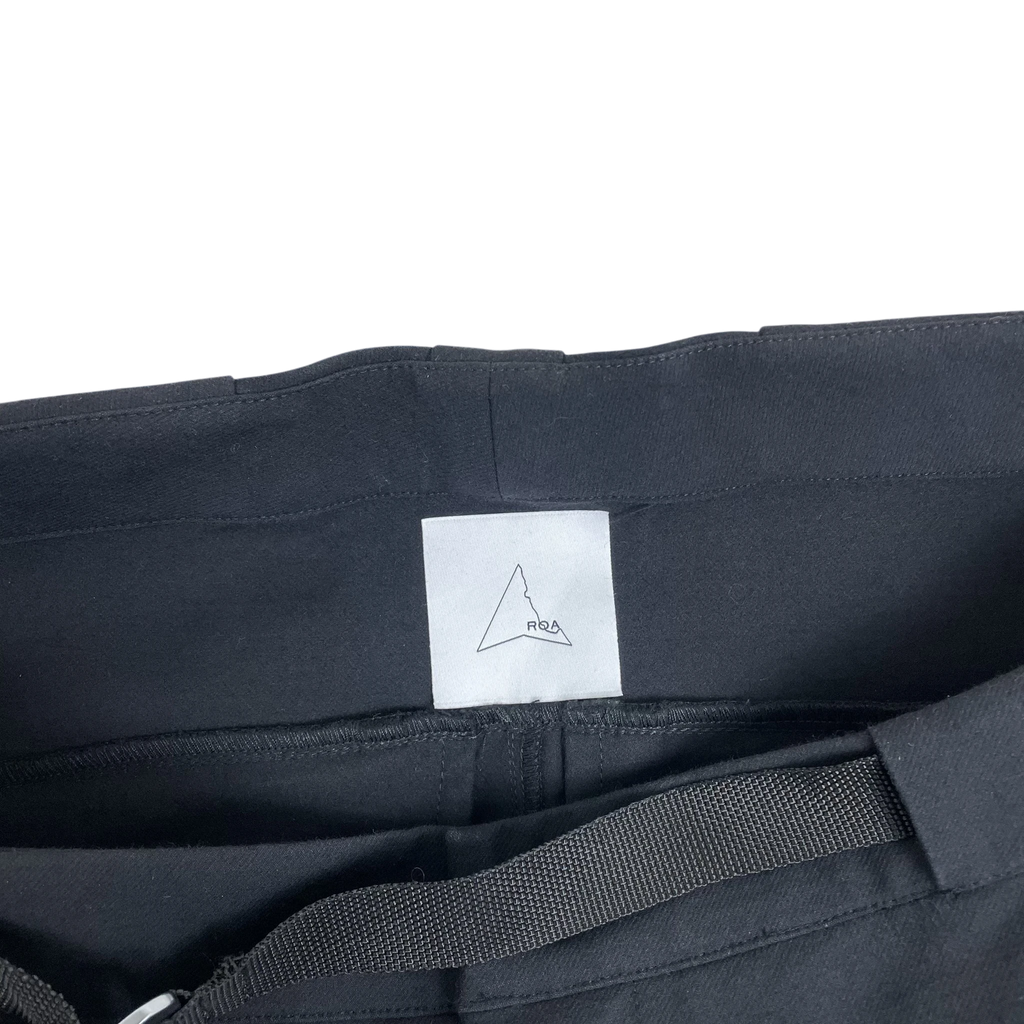 Zenno Archive ROA black softshell technical pants with internal brand label and integrated belt detail