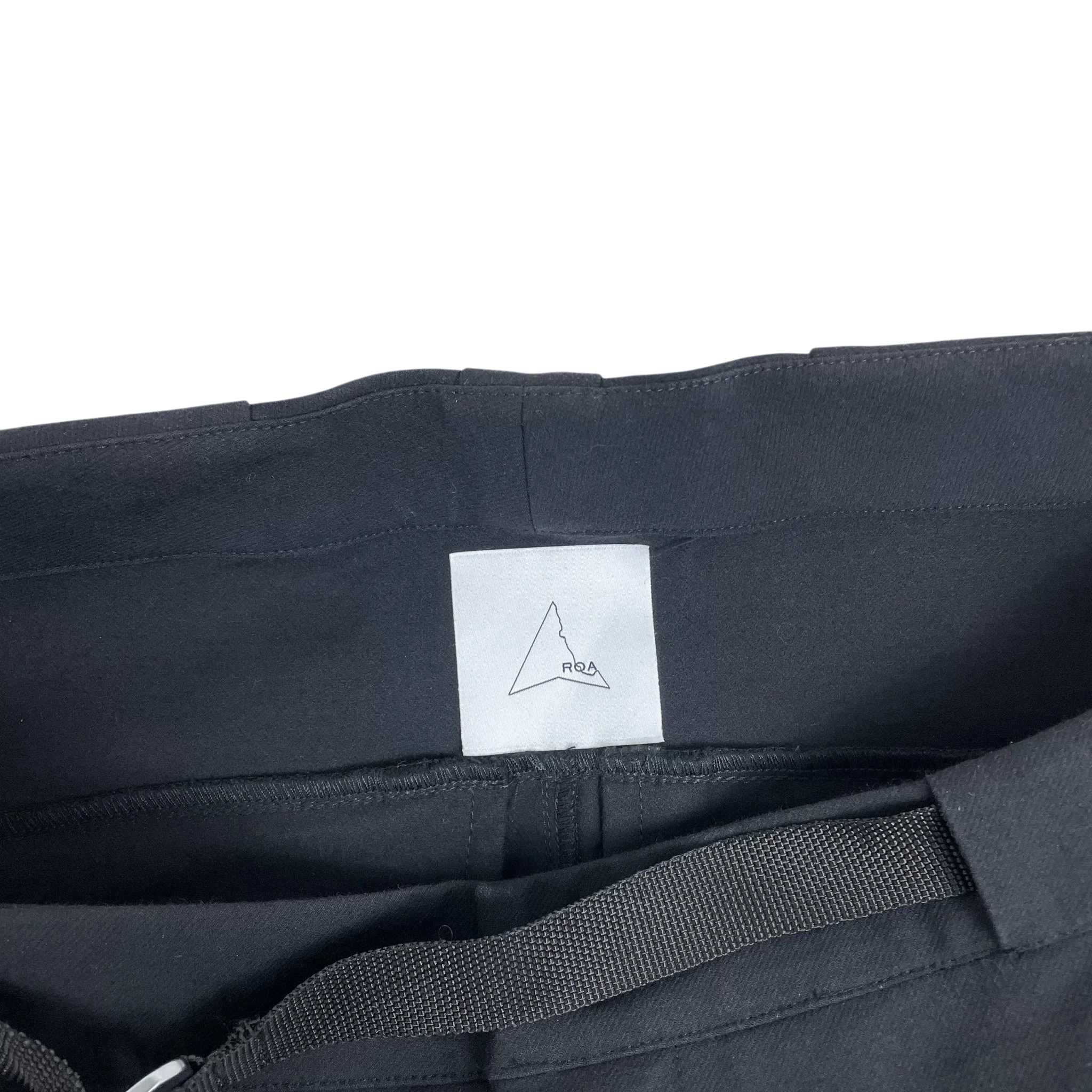 Zenno Archive ROA black softshell technical pants with internal brand label and integrated belt detail