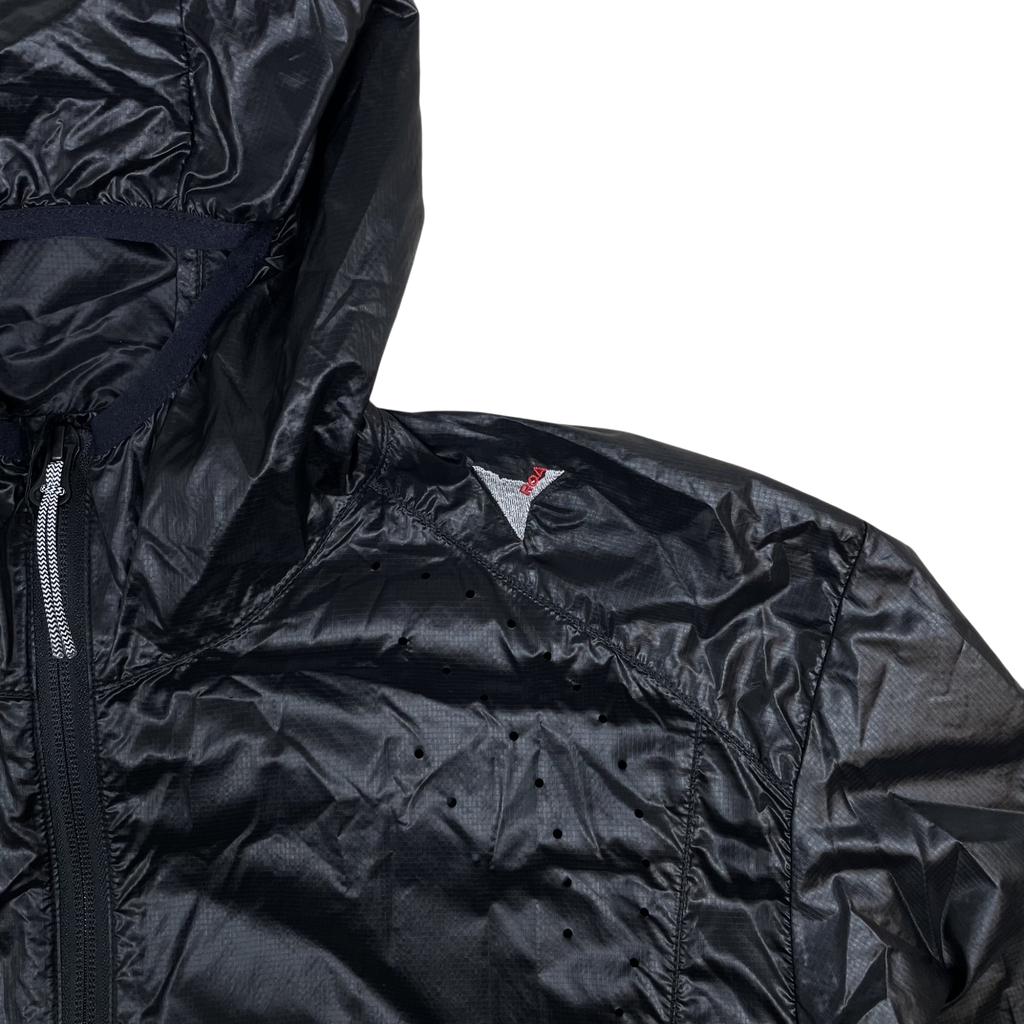 Zenno Archive ROA Hue packable black wind jacket with laser-cut ventilation holes and red logo detail