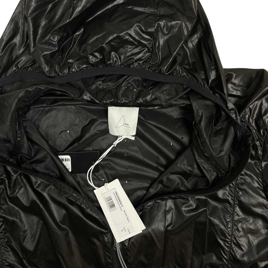 Zenno Archive ROA Hue packable wind jacket in black with a hooded design and brand tag detail