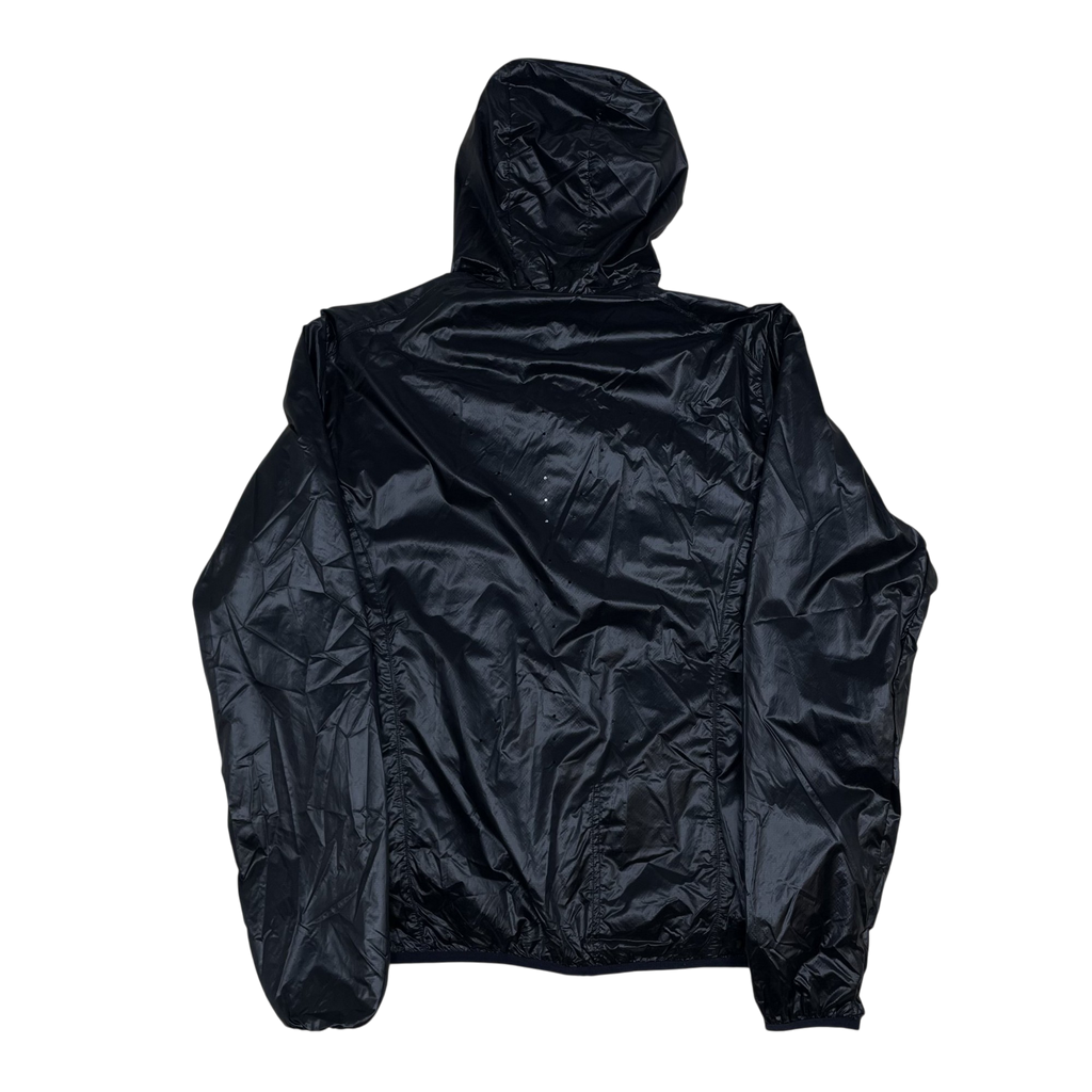 Zenno Archive ROA Hue packable wind jacket in black, featuring a lightweight hooded design, back view.