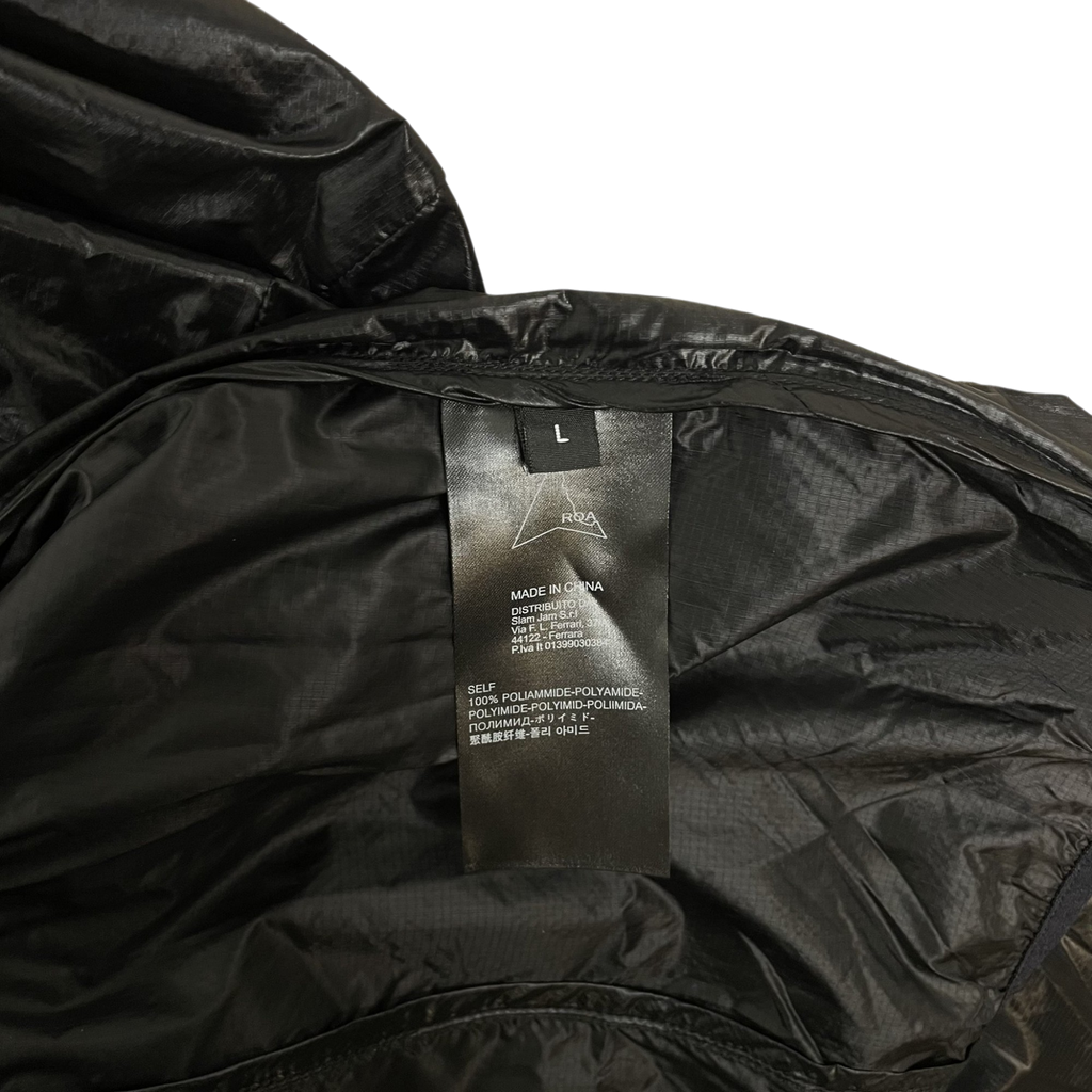 Zenno Archive ROA Hue packable wind jacket black size L interior label showing polyamide material composition