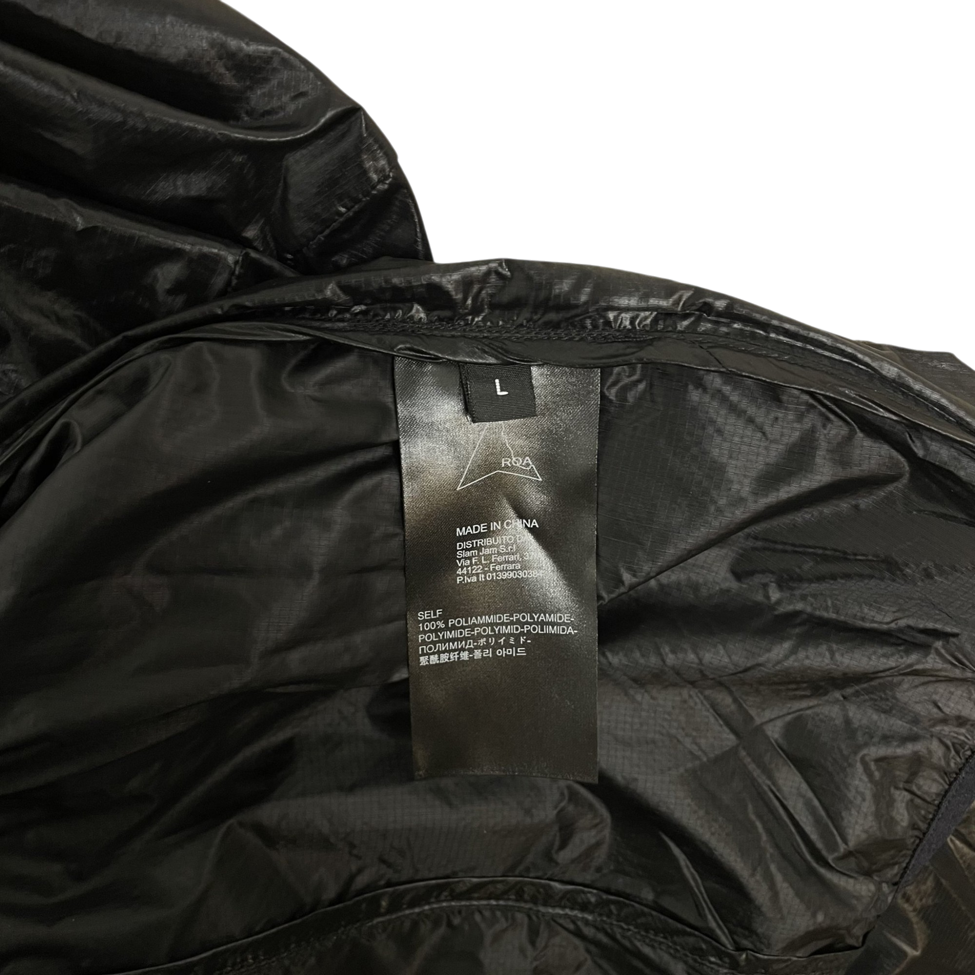Zenno Archive ROA Hue packable wind jacket black size L interior label showing polyamide material composition