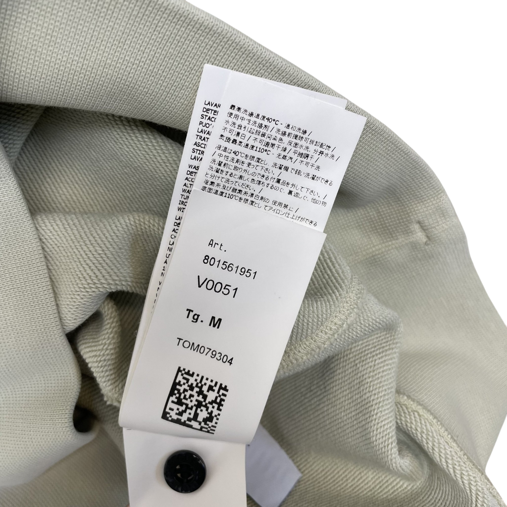 Zenno Archive Stone Island garment-dyed quarter-zip sweatshirt care label with product code 801561951 in pale blue