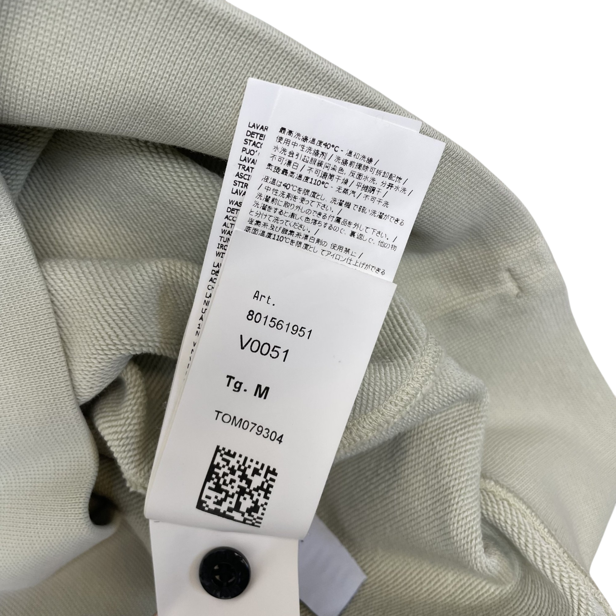 Zenno Archive Stone Island garment-dyed quarter-zip sweatshirt care label with product code 801561951 in pale blue