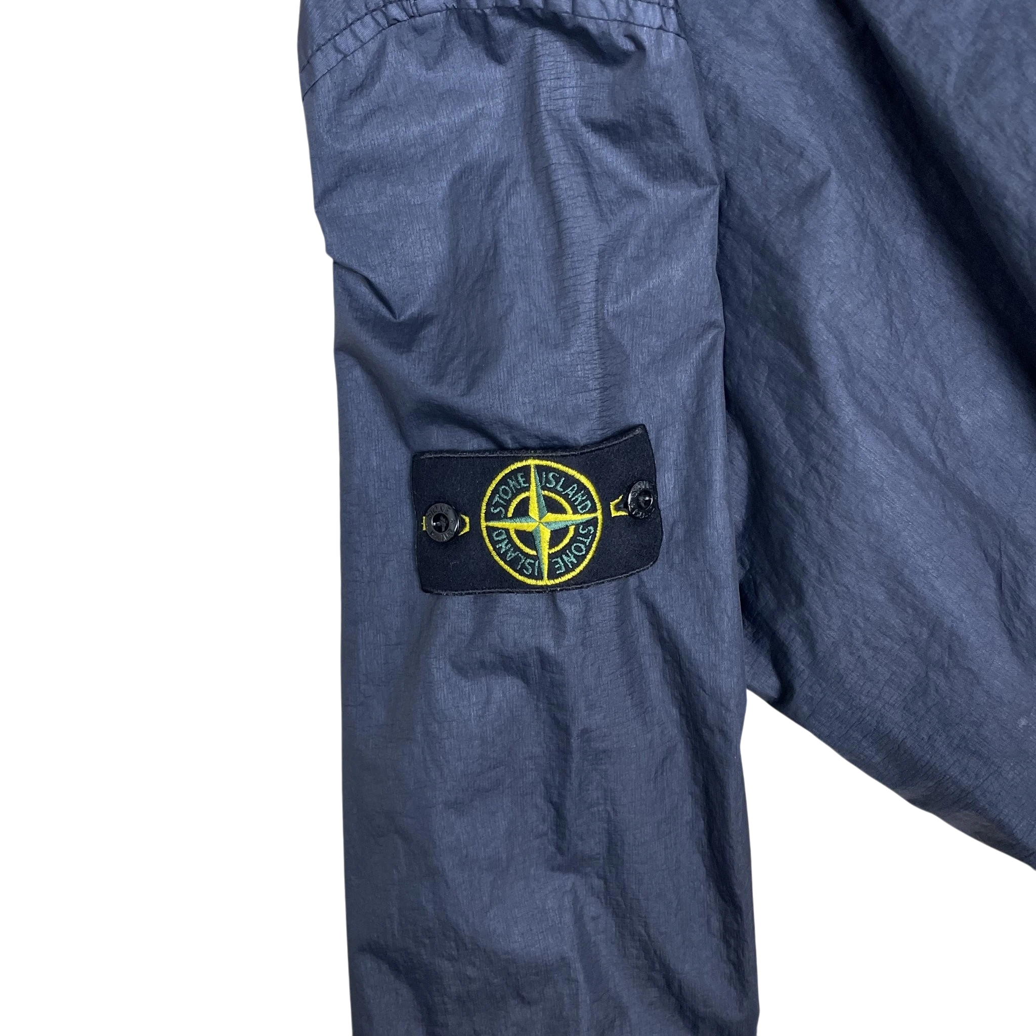 Zenno Archive Stone Island Membrana 3L TC navy overshirt sleeve with iconic yellow and green compass logo patch