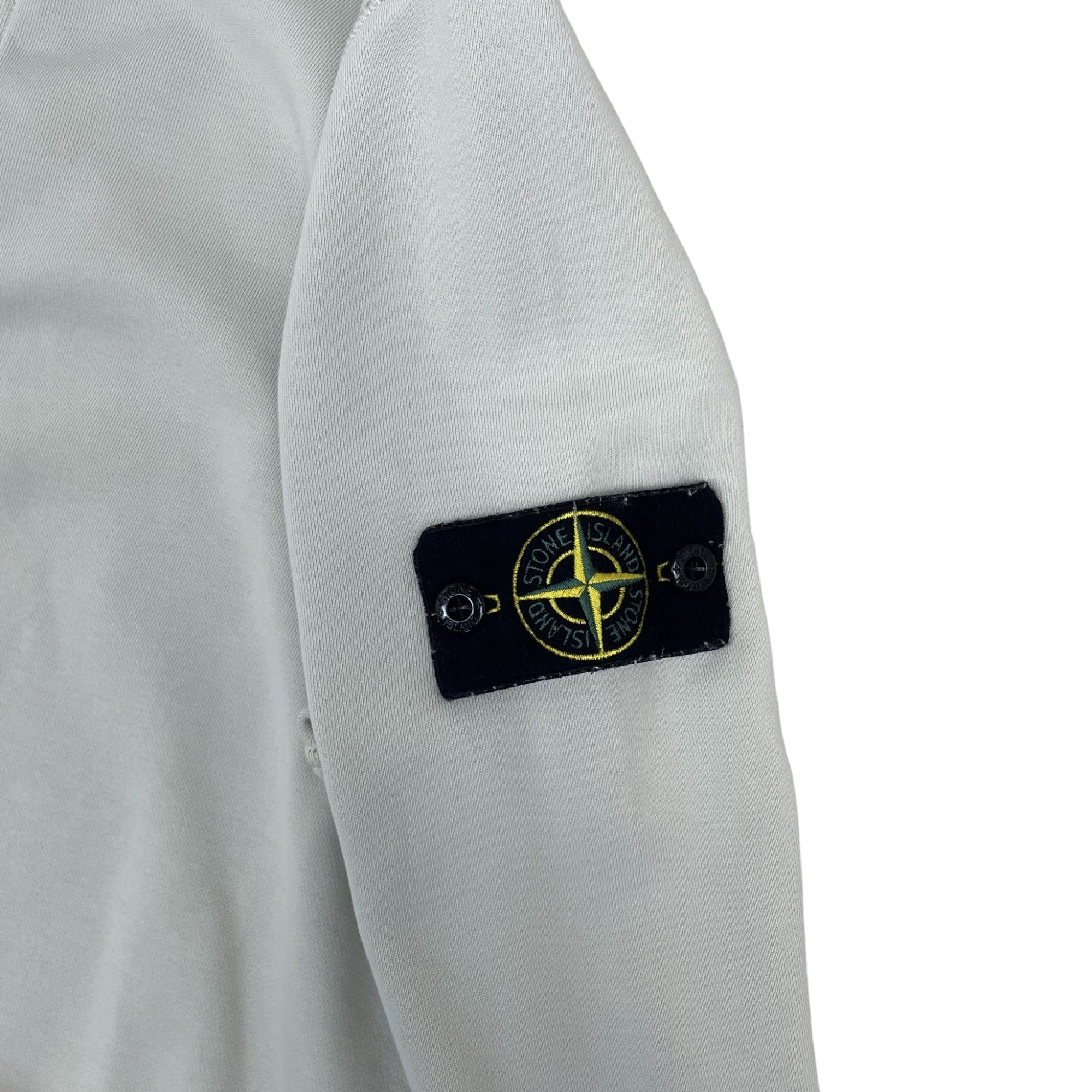 Zenno Archive Stone Island garment-dyed pale blue sweatshirt sleeve with iconic compass patch logo