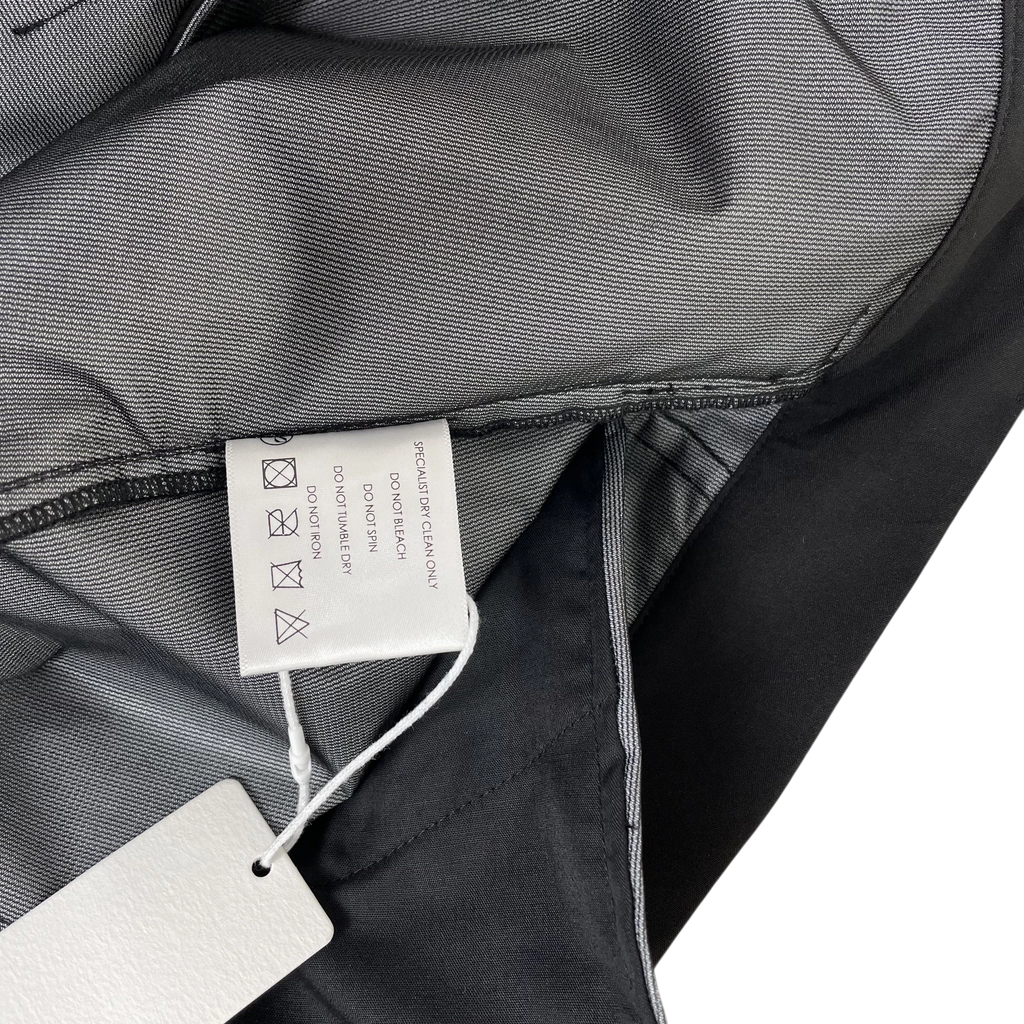 Zenno Archive Nouveou Project technical trousers interior showing care label and brand tag