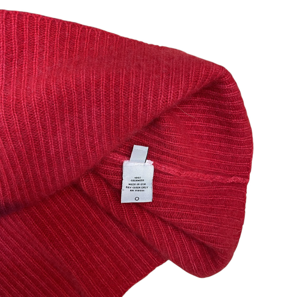 Zenno Archive The Elder Statesman red cashmere cardigan with care label detail showing 100 percent cashmere material