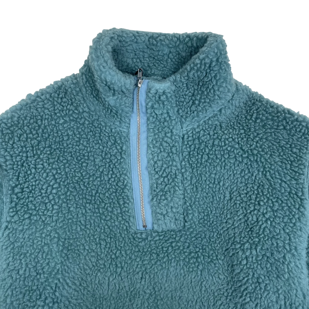Zenno Archive Cav Empt turquoise fleece pullover with an asymmetric zip collar and textured sherpa material.