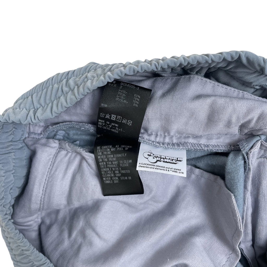 Zenno Archive Undercover A Clockwork Orange track pants interior label and care tag in baby blue fabric