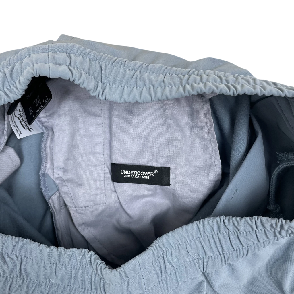 Zenno Archive Undercover Jun Takahashi A Clockwork Orange track pants interior label and elastic waistband