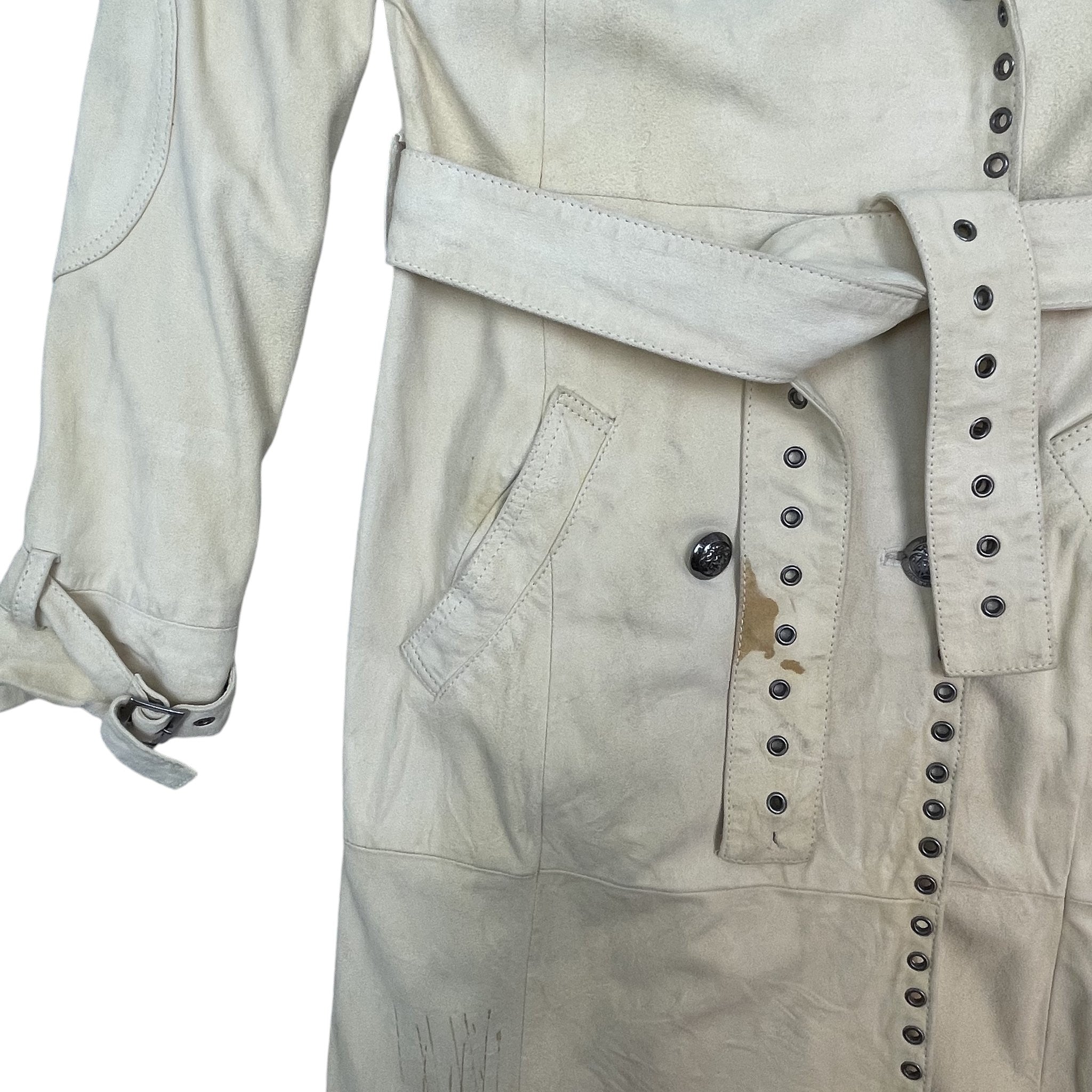 Zenno Archive vintage Versace light yellow suede trench coat featuring metal eyelet detailing and a waist belt.