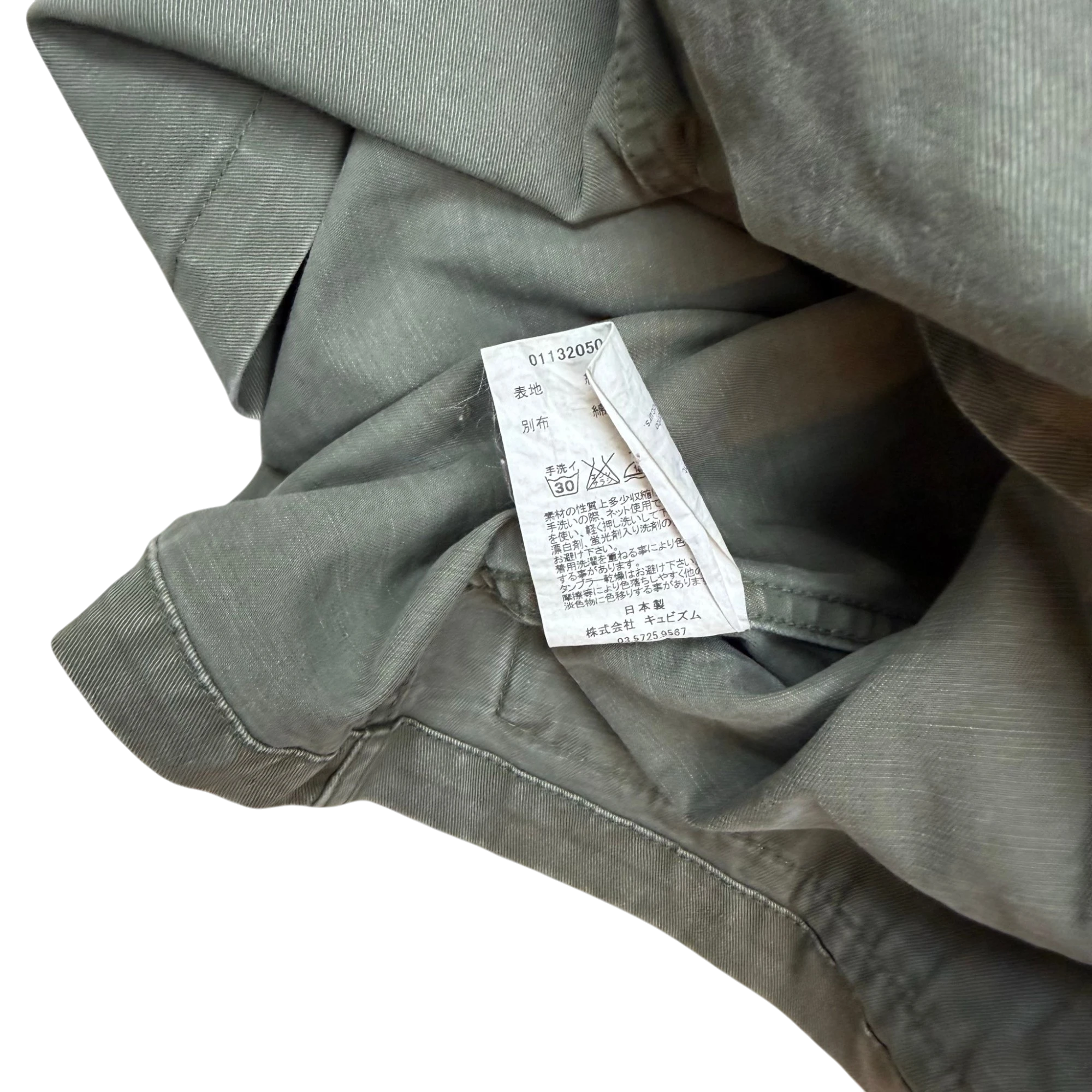 Zenno Archive Visvim SS15 Kilgore military jacket interior care label and green cotton fabric detail
