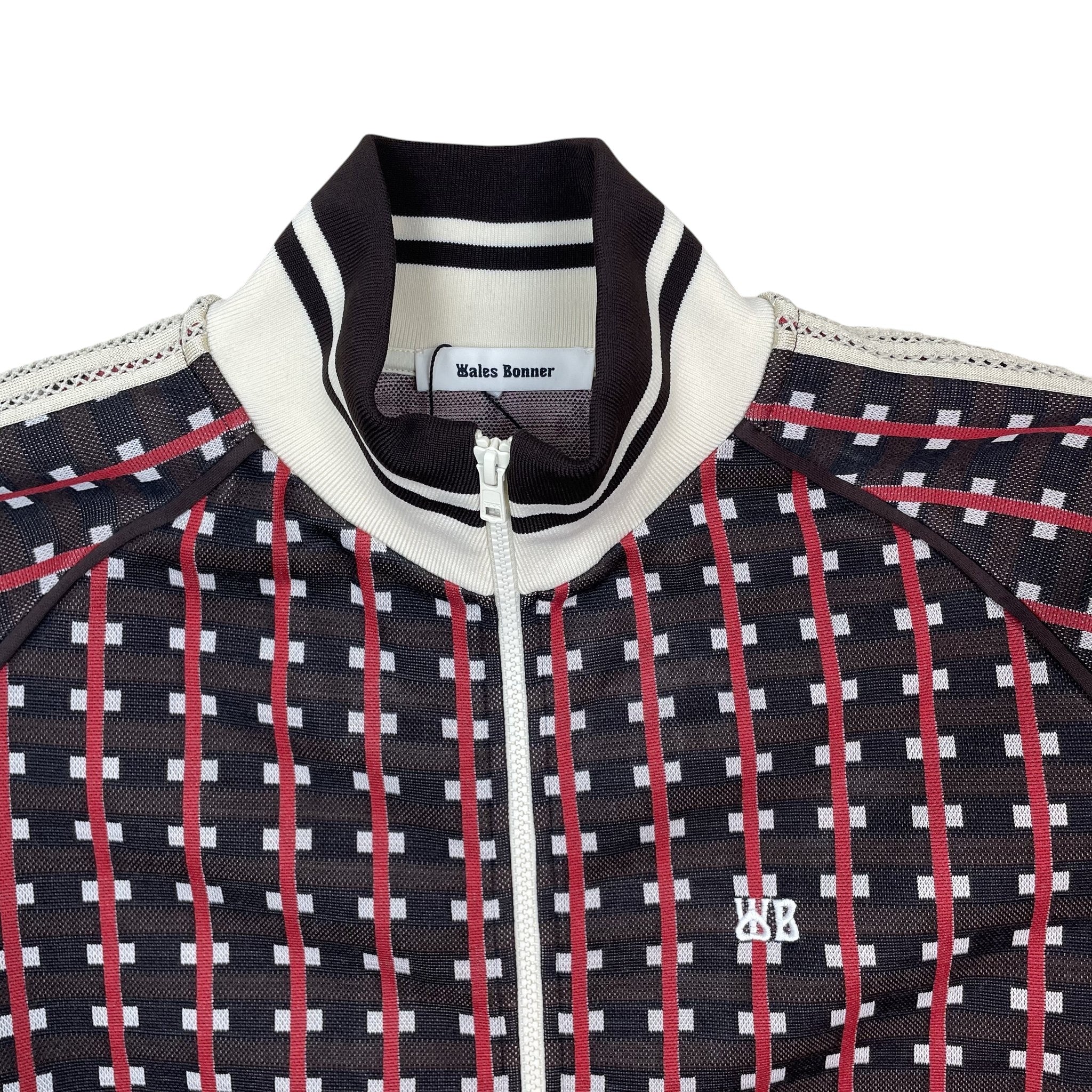 Zenno Archive Wales Bonner Power track jacket in brown and red with a checkered pattern and white WB logo embroidery.