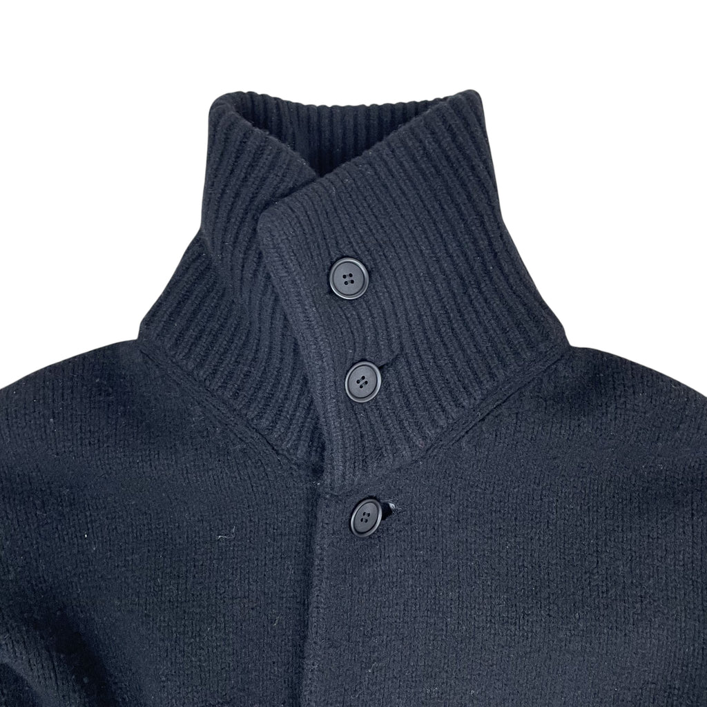 Zenno Archive Yohji Yamamoto Pour Homme black wool coat featuring a high ribbed collar and button-up front closure.